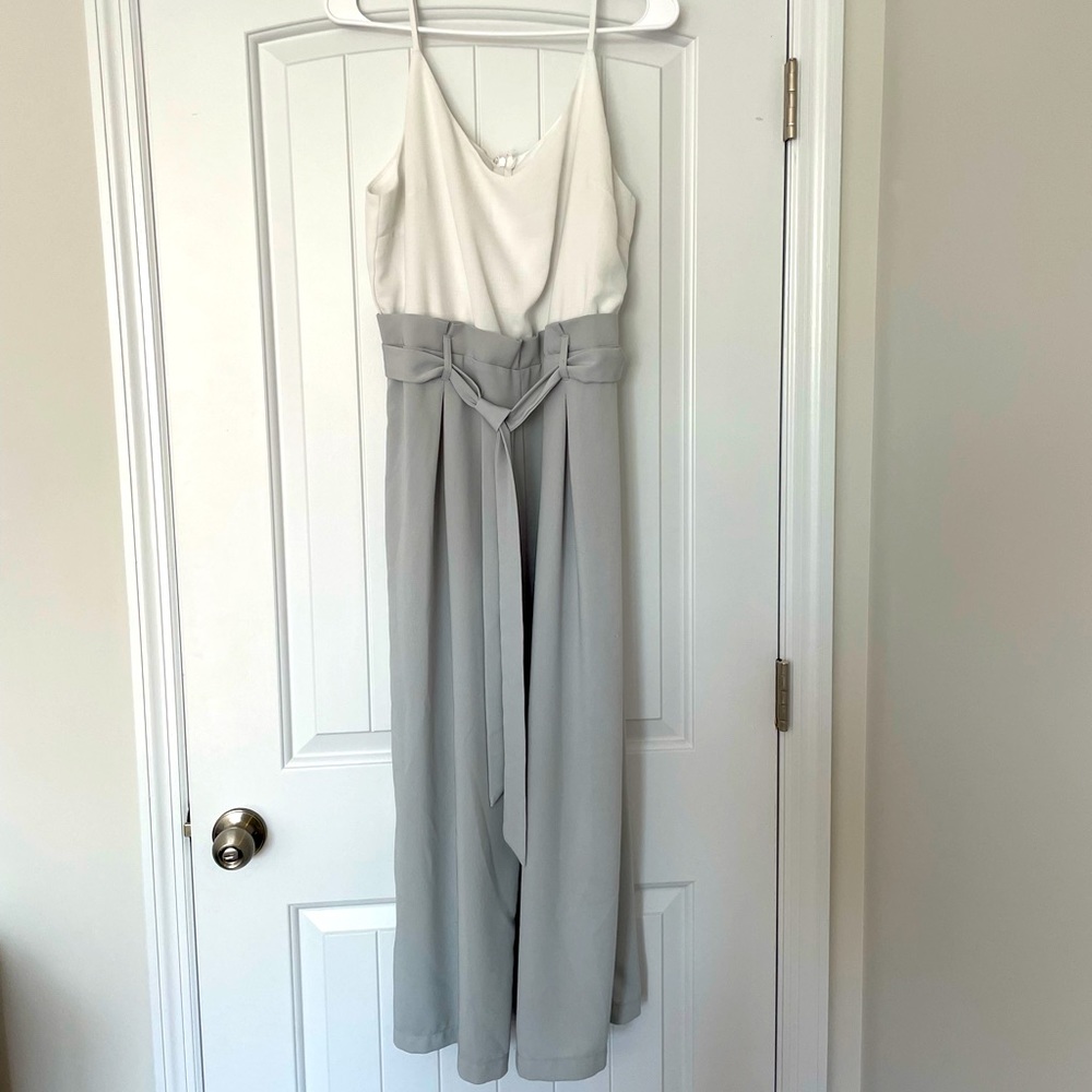 Women’s jumpsuit. White top and ashy/grey mint bottom. Can be dressed up or down